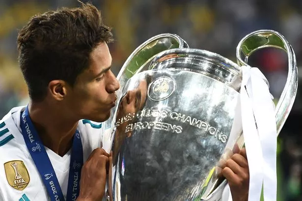 Varane and Champions League trophy